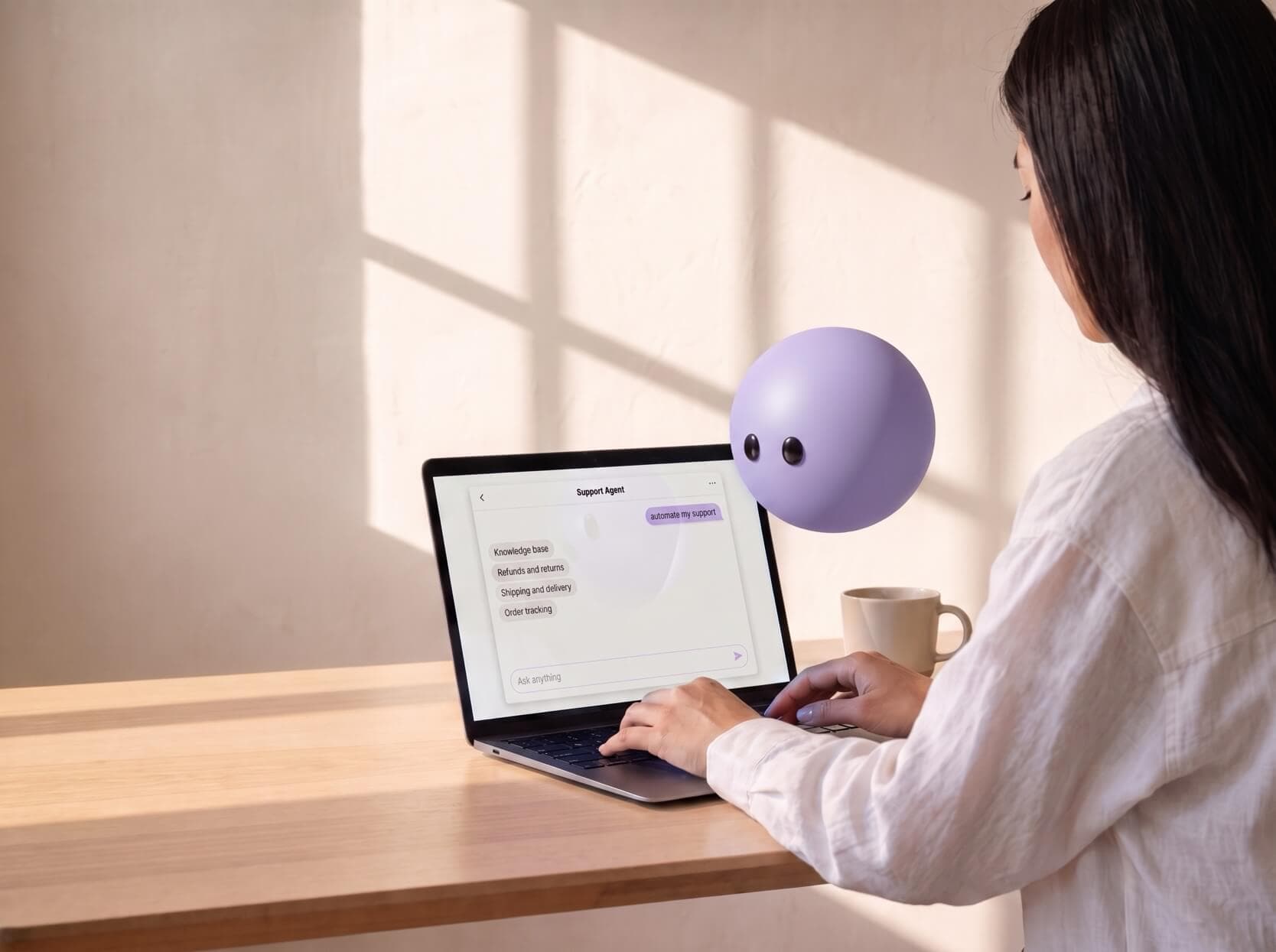 A support lead at a laptop showing the Ayro panel with a freshly written knowledge base, and Ayro pictured as a lavender sphere floating beside the screen.